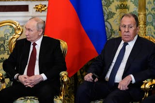 Russia's president Vladimir Putin and Russia's foreign minister Sergei Lavrov attend a meeting in Moscow